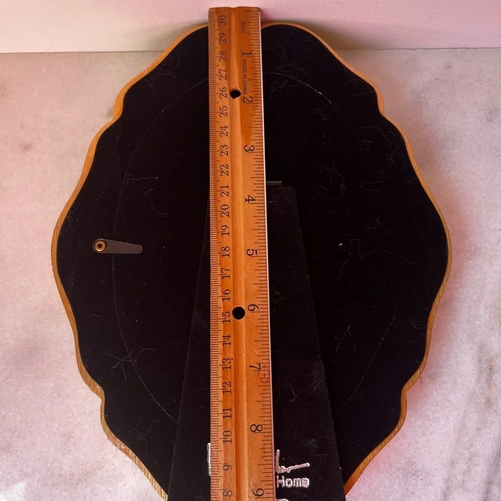 Nicole Miller sophisticated oval